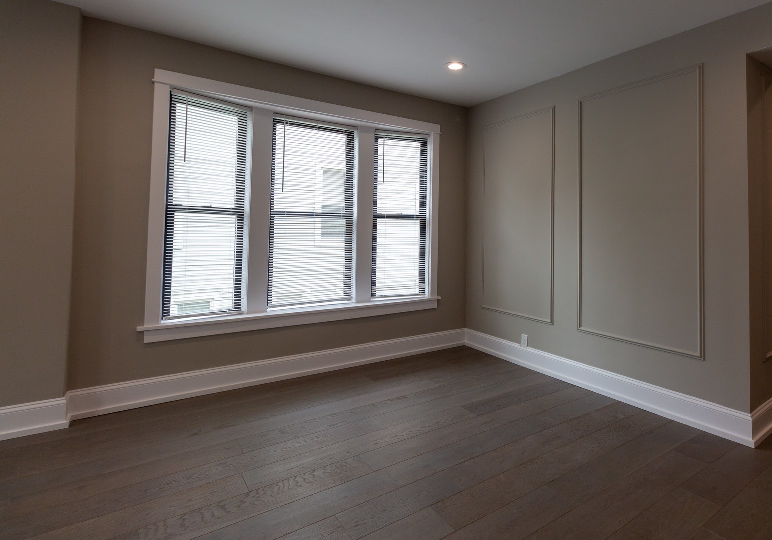 3755 West Addison Street, Unit 2E Chicago, IL 60618 - Photo 7 of 20 a view of an empty room with a window