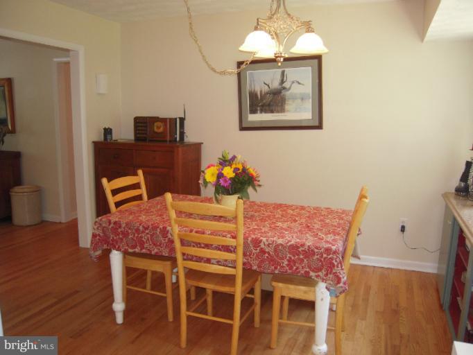 1201 Harding Lane Silver Spring, MD 20905 - Photo 7 of 23 a dining room with furniture and window