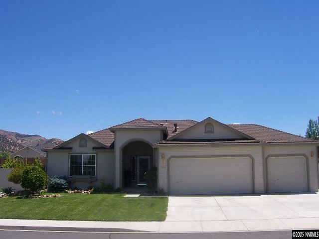 724 Silver Mine Court Reno, NV 89521 - Photo 1 of 9 a view of a house with a yard