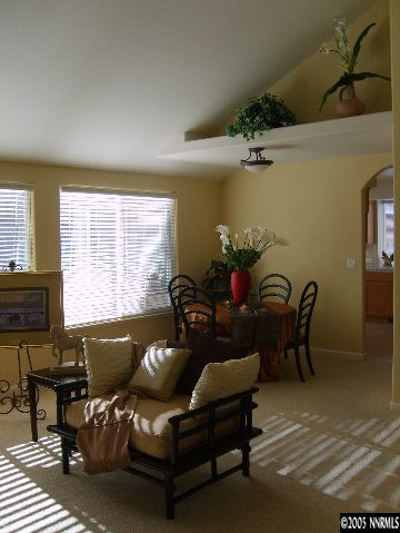 724 Silver Mine Court Reno, NV 89521 - Photo 3 of 9 a living room with furniture and a large window