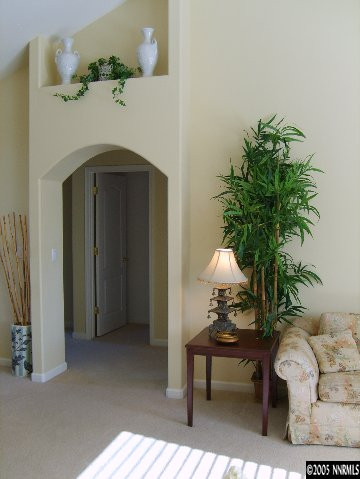 724 Silver Mine Court Reno, NV 89521 - Photo 4 of 9 a living room with furniture and a potted plant