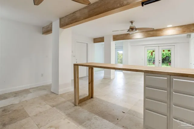 a view of an empty room and window