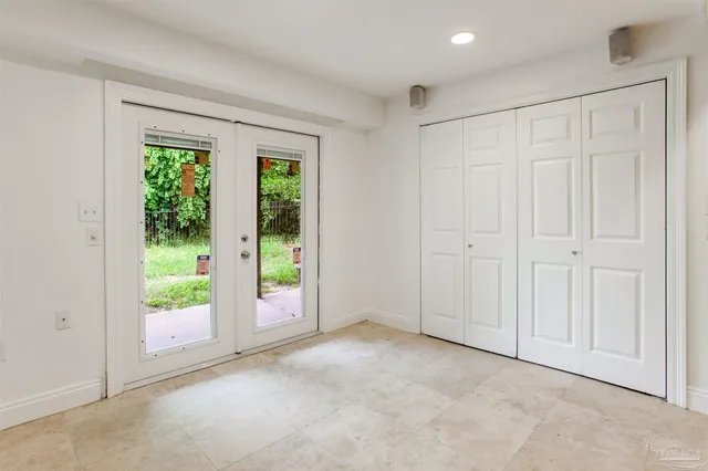 a kitchen with stainless steel appliances granite countertop a sink and a microwave