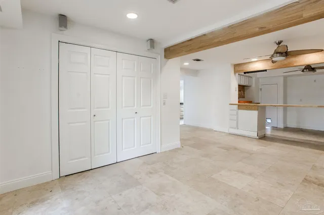 a kitchen with stainless steel appliances granite countertop a stove and a microwave