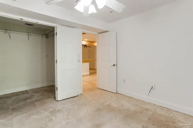 an empty room with a bathroom
