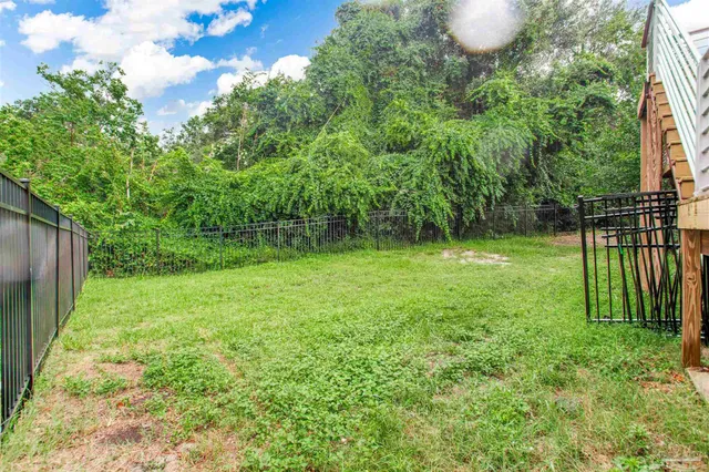 a view of a porch with a backyard