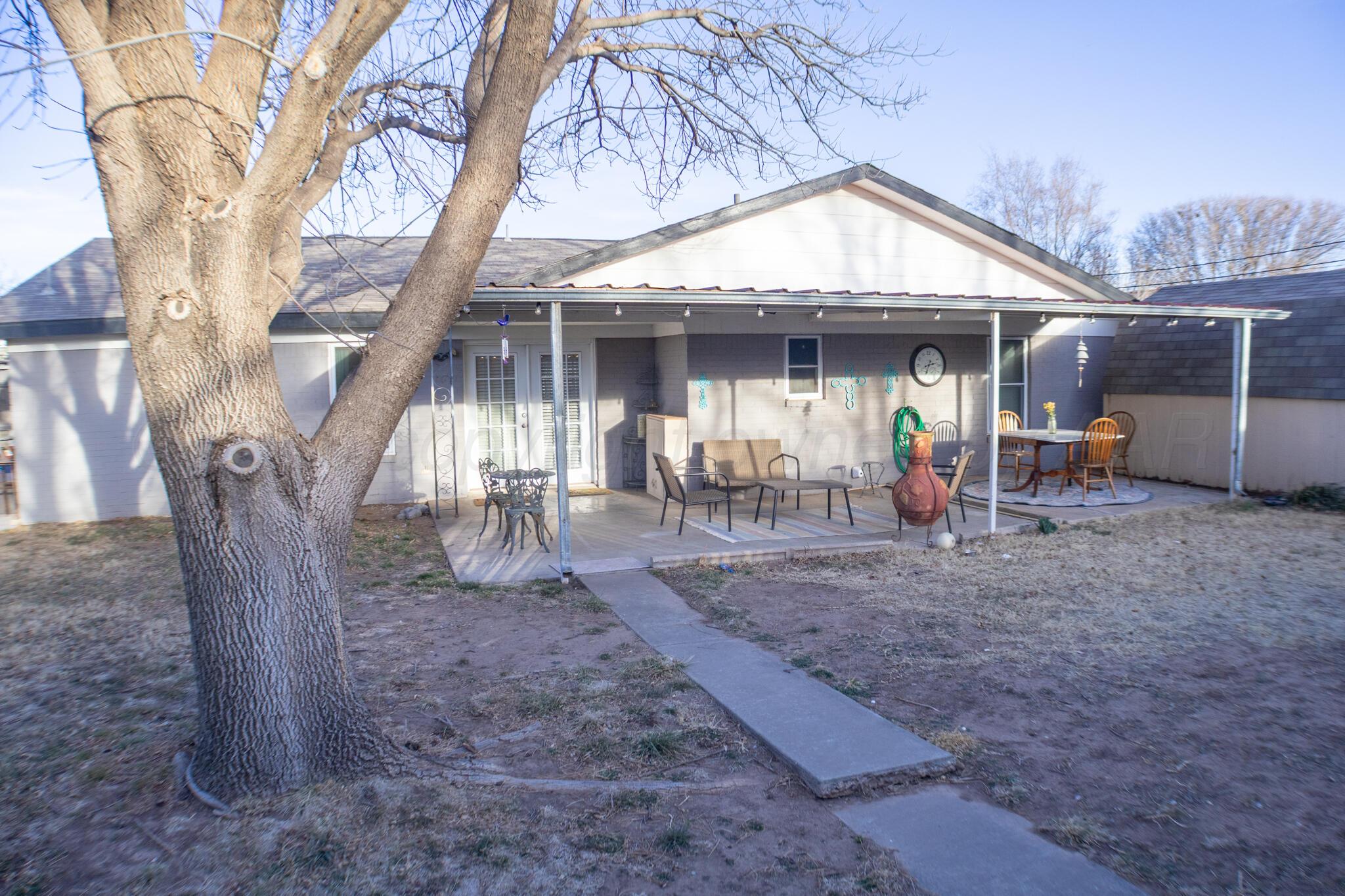 4504 Goodnight Trail Amarillo, TX 79109 - Photo 31 of 32 a view of a house with backyard