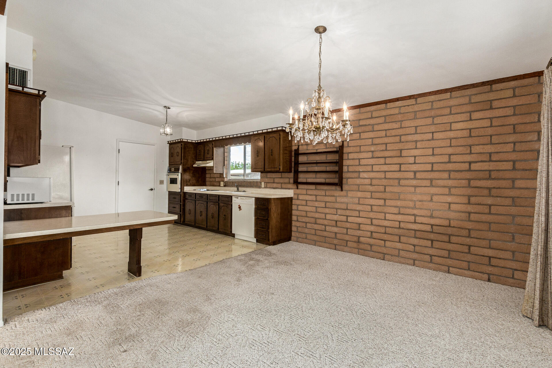16381 South Observatory Place Vail, AZ 85641 - Photo 10 of 23 a view of a kitchen with microwave and cabinets