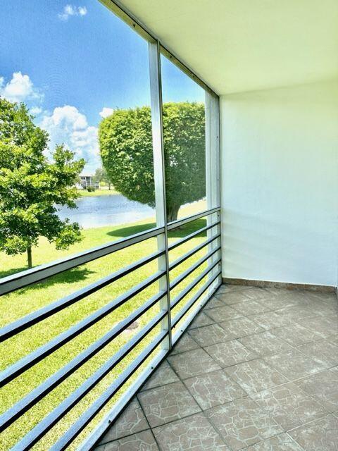 142 Brighton D Boca Raton, FL 33434 - Photo 10 of 26 Screened Patio w/Lake View
