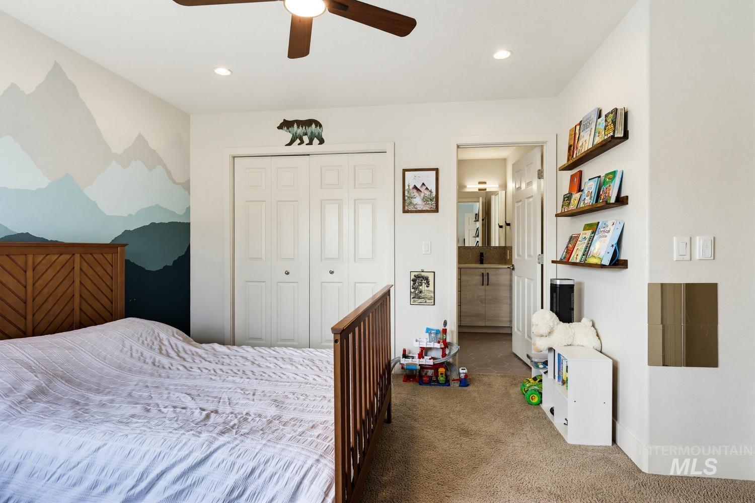 369 South Winthrop Way Boise, ID 83709 - Photo 33 of 50 Carpeted bedroom featuring a wood-finish bed frame, ceiling fan, and recessed lighting