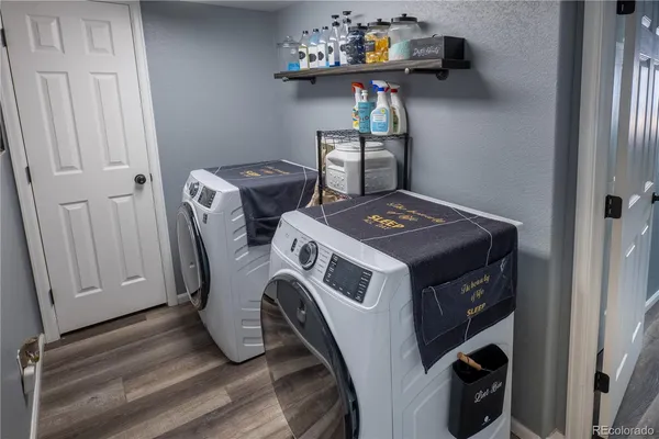 a utility room with dryer and washer