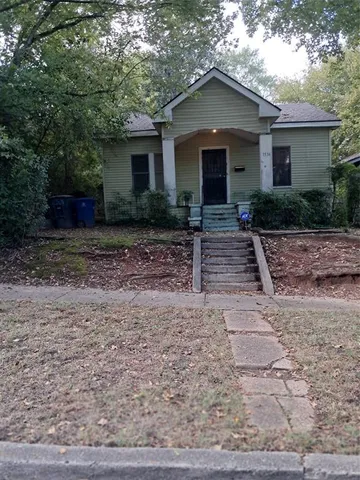 a front view of house with yard