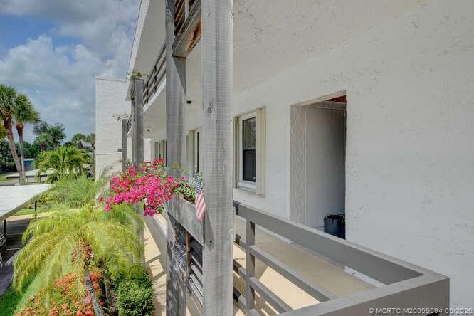1950 Southwest Palm City Road, Unit 3209 Stuart, FL 34994 - Photo 29 of 64 Exterior catwalk entrance.