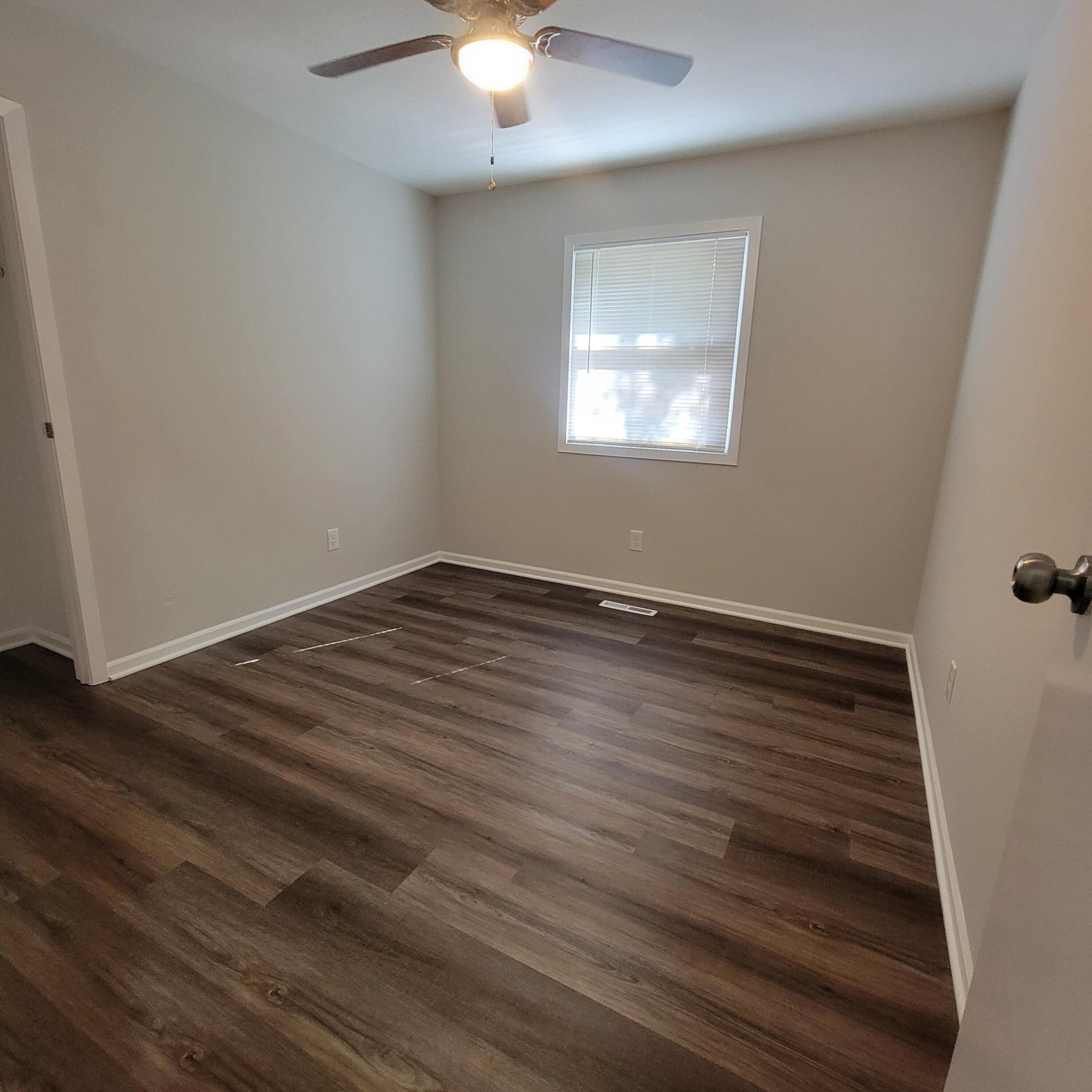 6676 Lakewood Avenue Portage, IN 46368 - Photo 10 of 14 wooden floor in an empty room