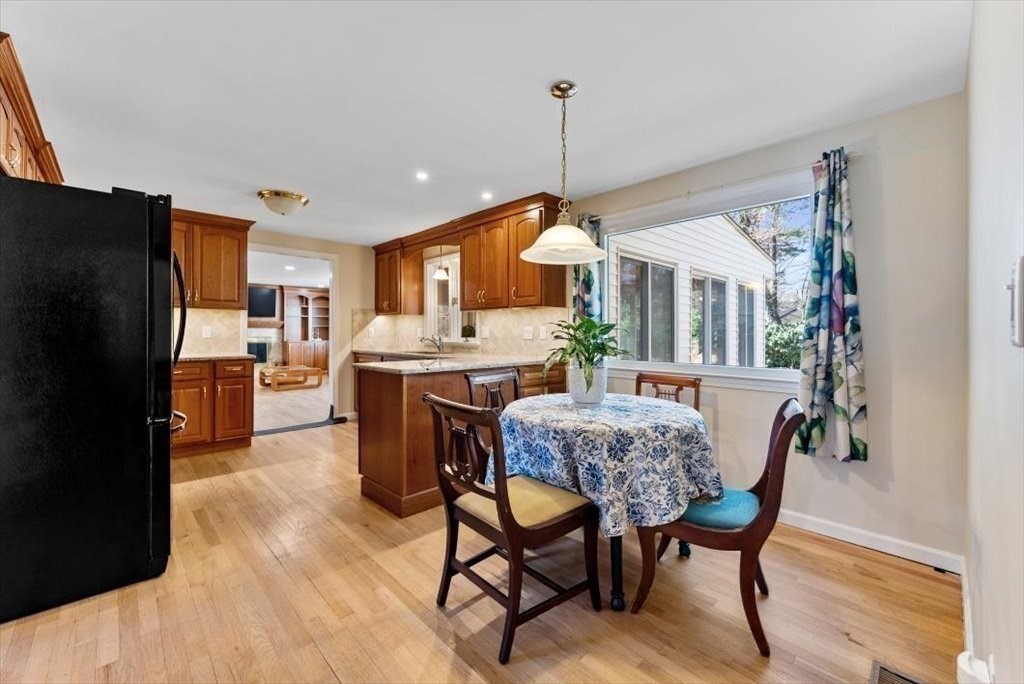 38 Blacksmith Road Wilbraham, MA 01095 - Photo 11 of 39 a view of a dining room with furniture window and wooden floor