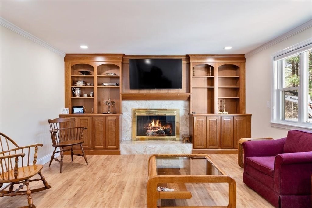 38 Blacksmith Road Wilbraham, MA 01095 - Photo 16 of 39 a living room with furniture and a fireplace