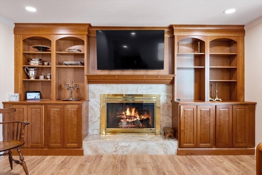 38 Blacksmith Road Wilbraham, MA 01095 - Photo 17 of 39 a living room with furniture and a fireplace