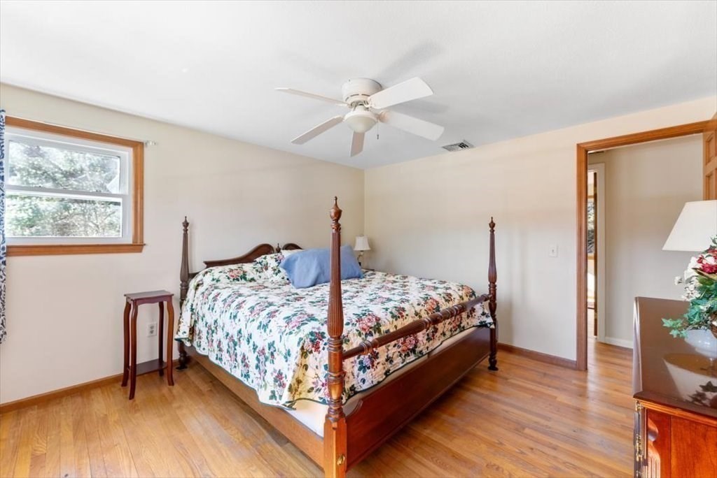 38 Blacksmith Road Wilbraham, MA 01095 - Photo 25 of 39 a bed sitting in a bedroom next to a window