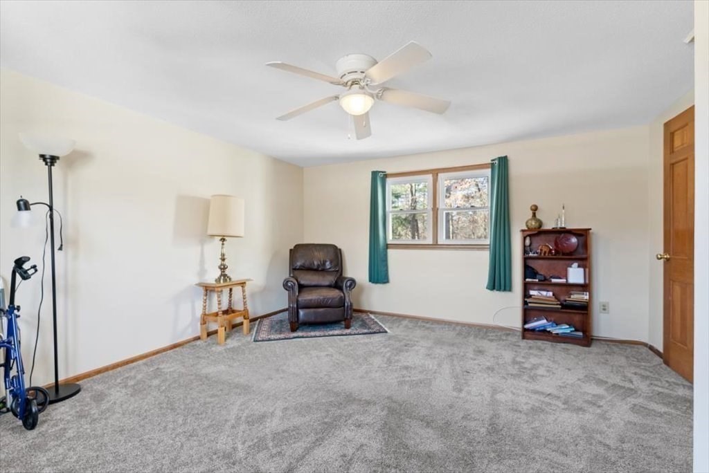 38 Blacksmith Road Wilbraham, MA 01095 - Photo 29 of 39 a view of a livingroom with furniture and a window