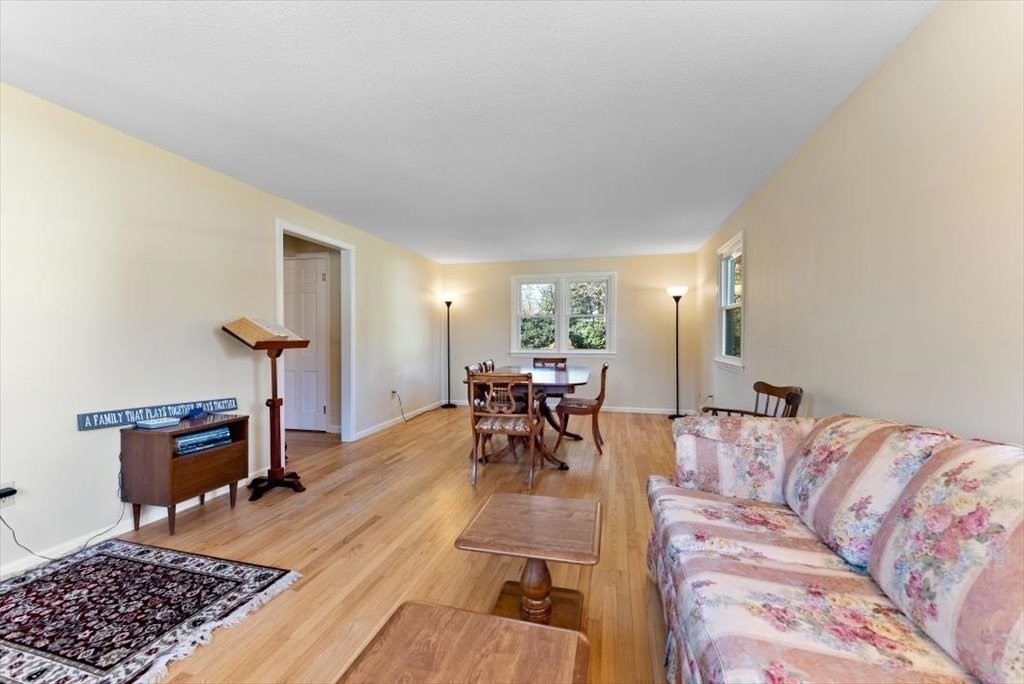 38 Blacksmith Road Wilbraham, MA 01095 - Photo 3 of 39 a living room with furniture and a table