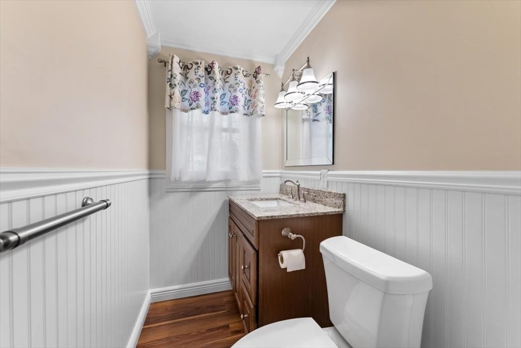 38 Blacksmith Road Wilbraham, MA 01095 - Photo 7 of 39 a bathroom with a toilet sink and mirror