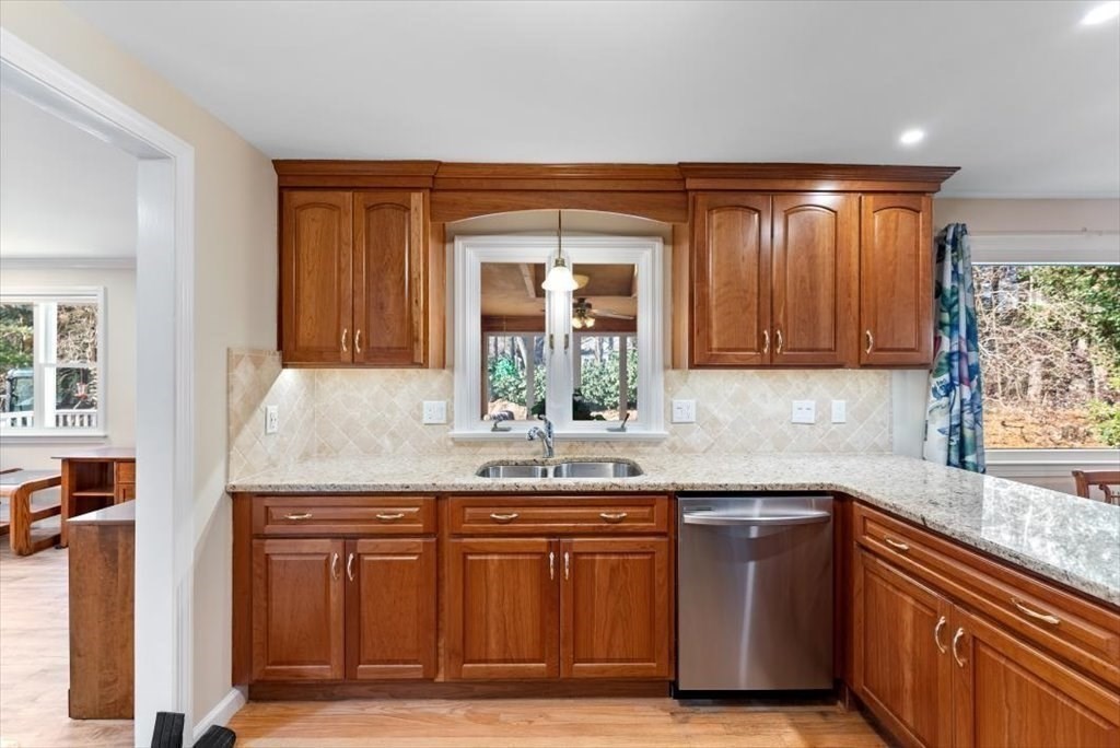 38 Blacksmith Road Wilbraham, MA 01095 - Photo 9 of 39 a kitchen with granite countertop stainless steel appliances a sink and cabinets