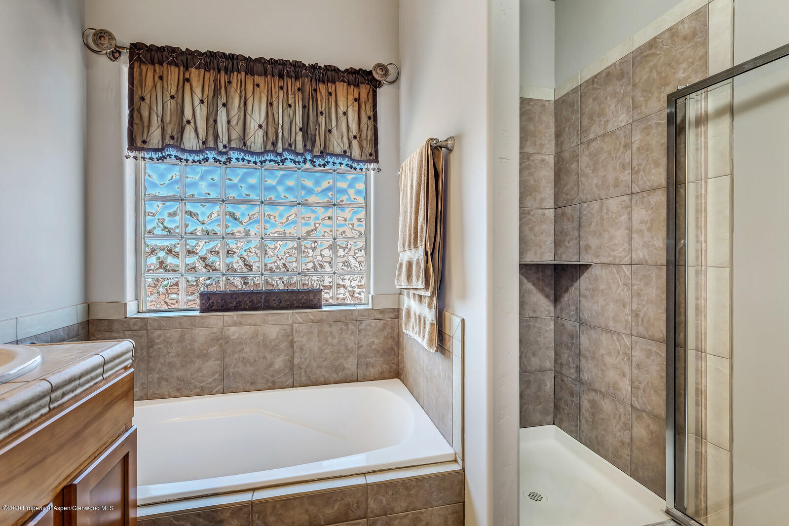 952 East 18th Street Rifle, CO 81650 - Photo 19 of 26 a bathroom with a bathtub and shower
