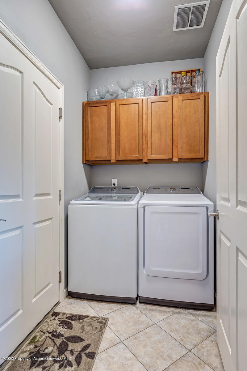 952 East 18th Street Rifle, CO 81650 - Photo 22 of 26 a utility room with a washer and dryer