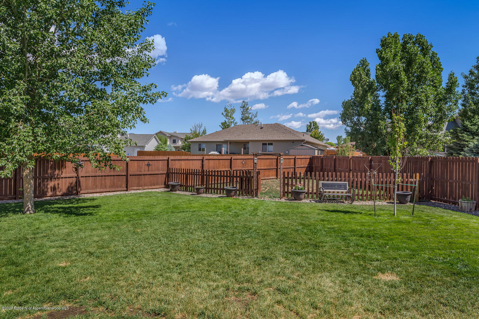 952 East 18th Street Rifle, CO 81650 - Photo 23 of 26 a view of a backyard with a garden