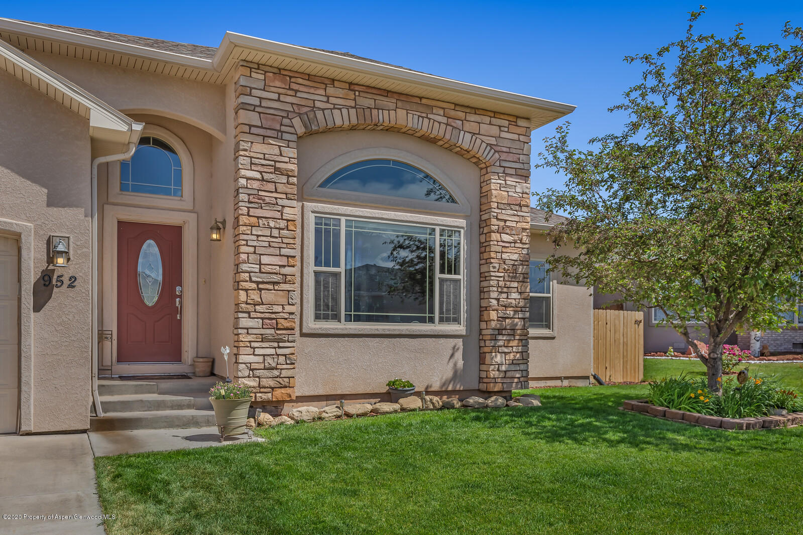952 East 18th Street Rifle, CO 81650 - Photo 6 of 26 a front view of a house with a yard