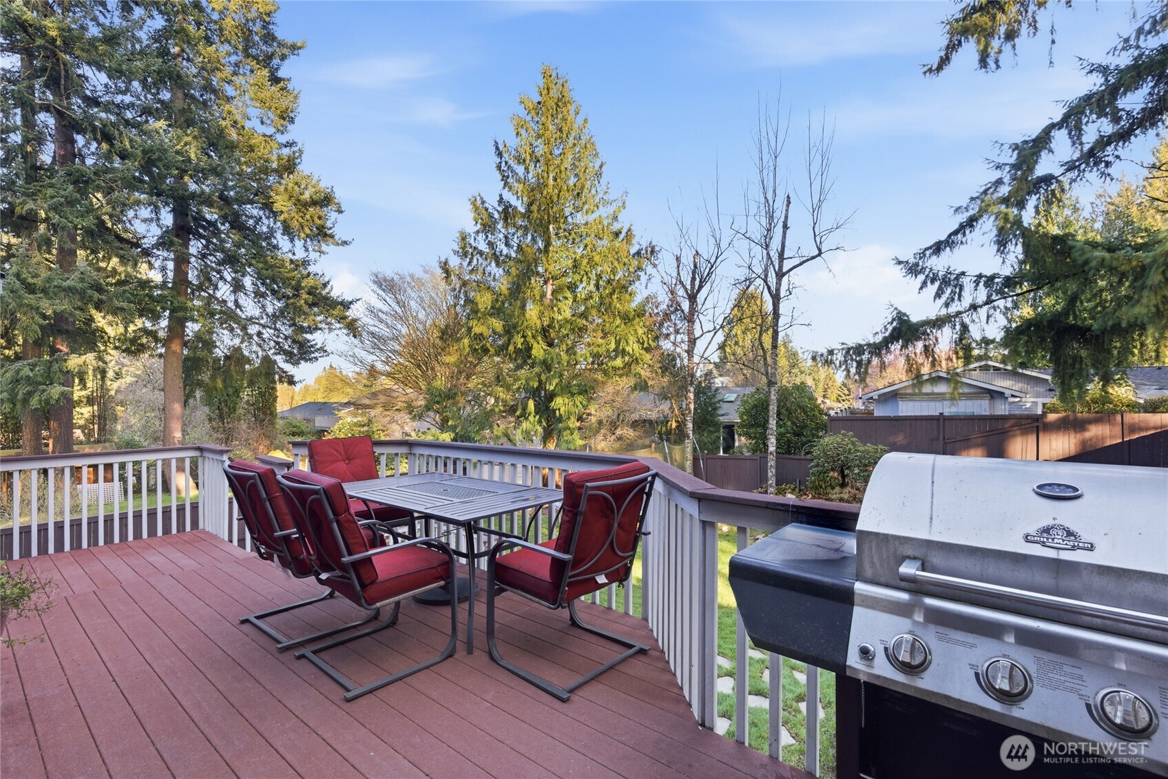 13011 Seattle Hill Road Snohomish, WA 98296 - Photo 32 of 40 an outdoor sitting area with furniture and wooden floor