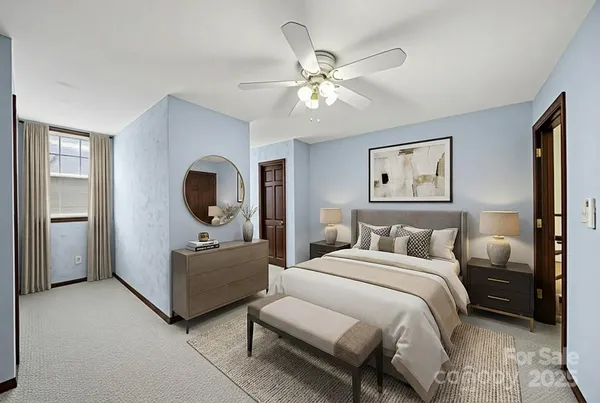 a bedroom with bed and window