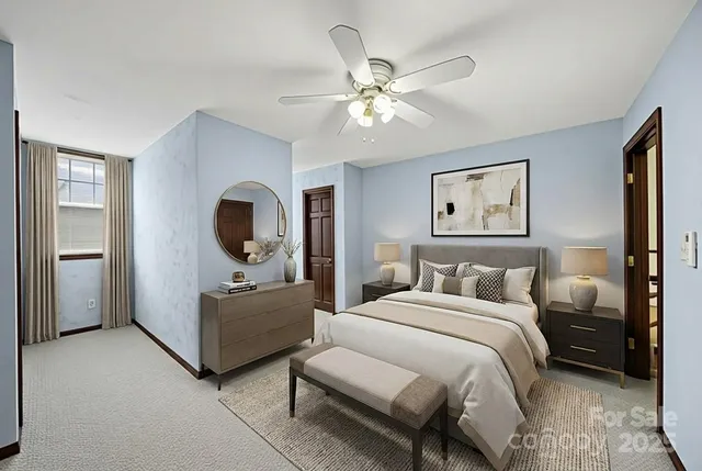 a bedroom with bed and window