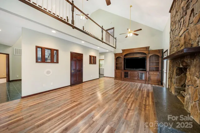 a view of a livingroom with wooden floor