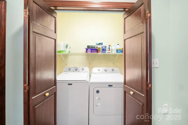 a room with window and washer