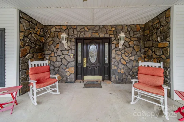 a living room with a couch and a table