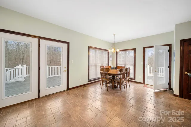 a view of a livingroom with furniture and a window