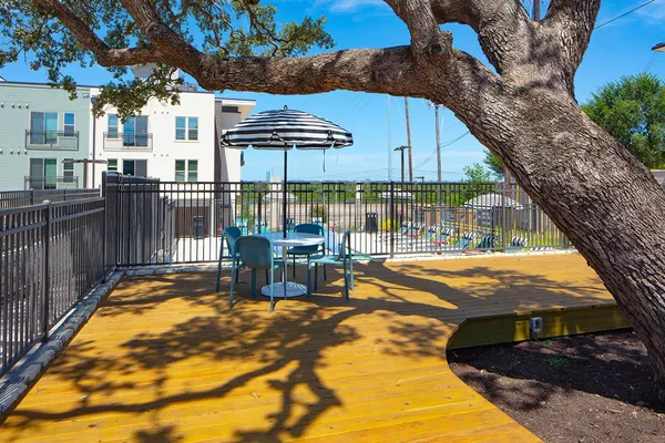 a view of a swimming pool with a patio
