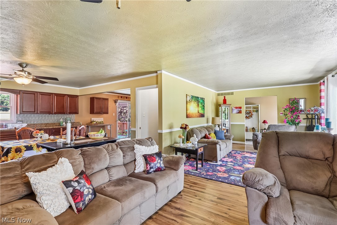 6109 North Oval Road Clinton, OH 44216 - Photo 13 of 47 Living room looking into kitchen