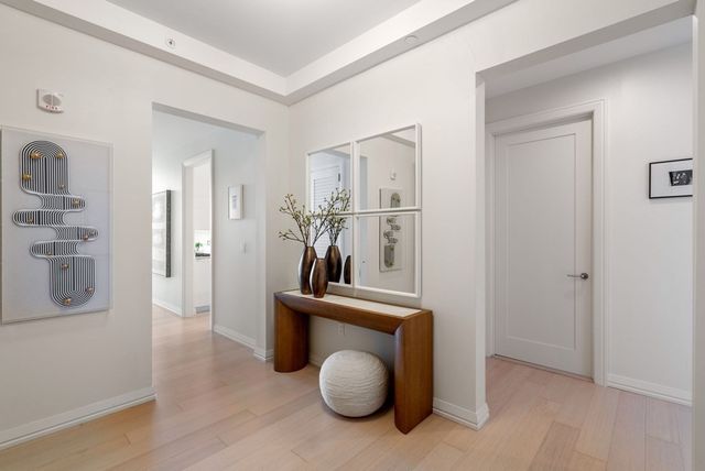 a view of swimming pool with seating area