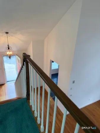 a view of entryway with stairs