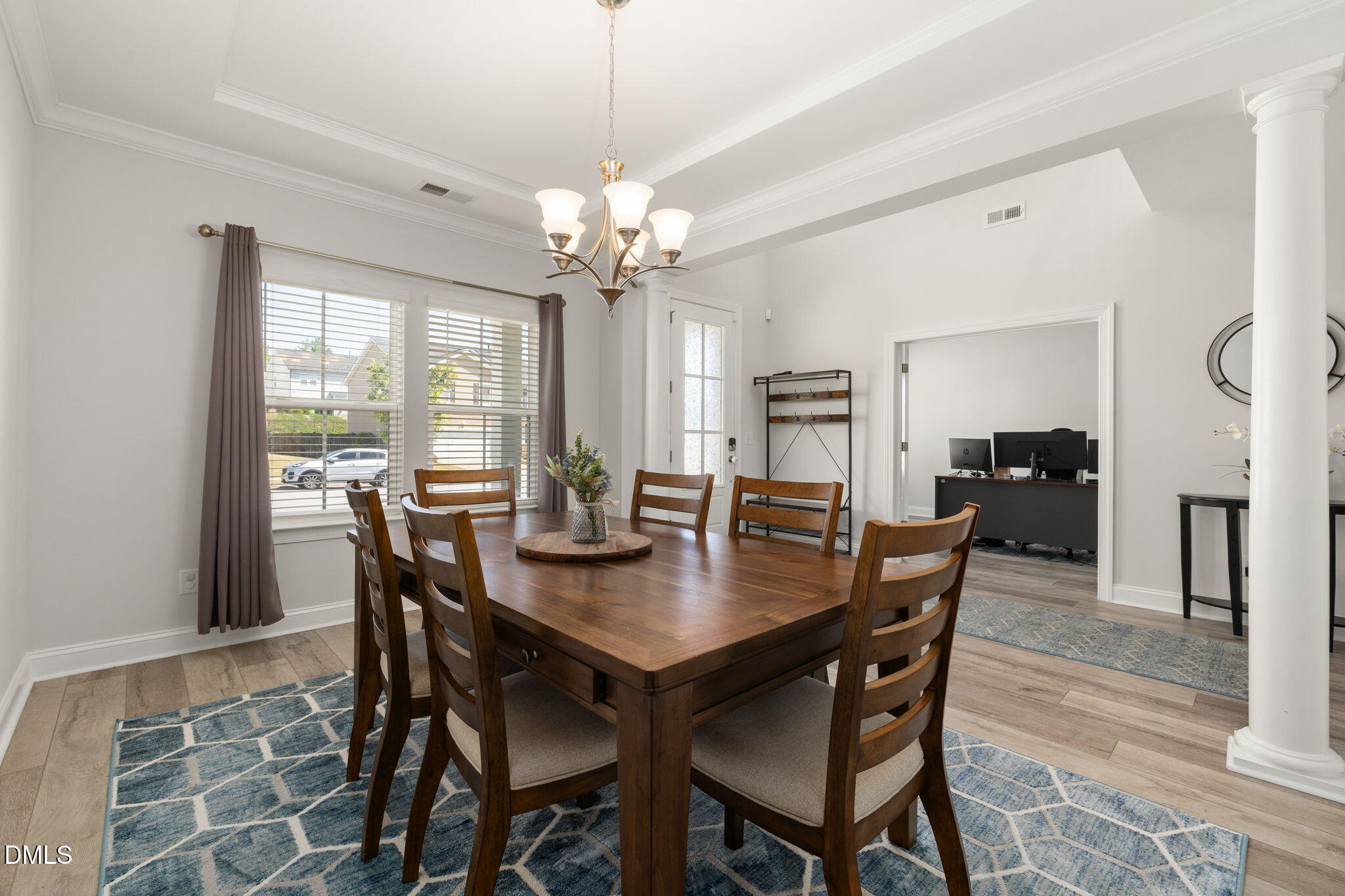 3422 Longleaf Estates Drive Raleigh, NC 27616 - Photo 9 of 71 a view of a dining room with furniture window and wooden floor