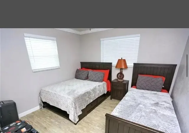 a bathroom with a sink toilet a mirror and bathtub