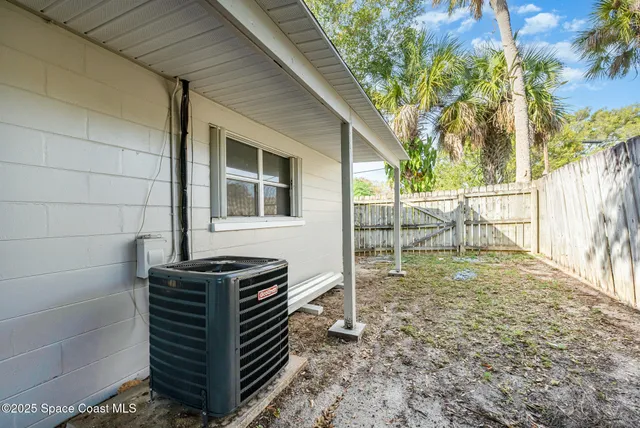 a house view with a backyard space