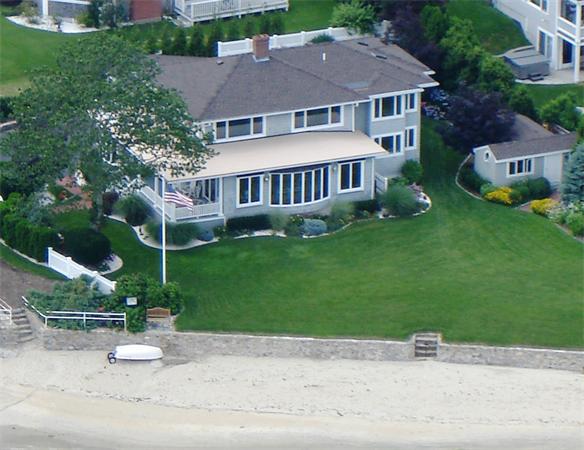 56 Massasoit Road Duxbury, MA 02332 - Photo 1 of 23 a aerial view of a house with a yard