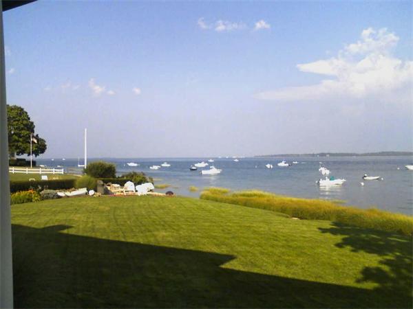 56 Massasoit Road Duxbury, MA 02332 - Photo 17 of 23 a view of a lake with a big yard