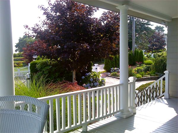 56 Massasoit Road Duxbury, MA 02332 - Photo 18 of 23 a view of a two chairs in the deck