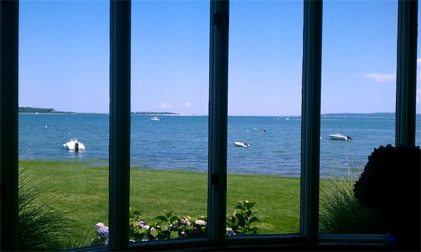 56 Massasoit Road Duxbury, MA 02332 - Photo 20 of 23 a view of a lake from a balcony