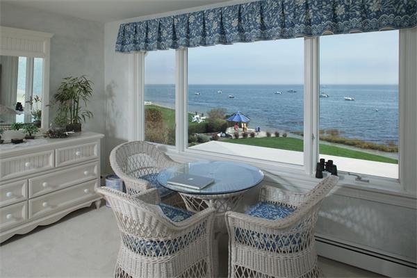 56 Massasoit Road Duxbury, MA 02332 - Photo 6 of 23 a dining room with furniture and a floor to ceiling window