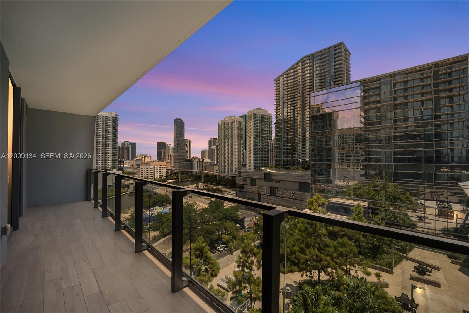 88 Southwest 7th Street, Unit 1009 Miami, FL 33130 - Photo 13 of 21 a city view from a balcony